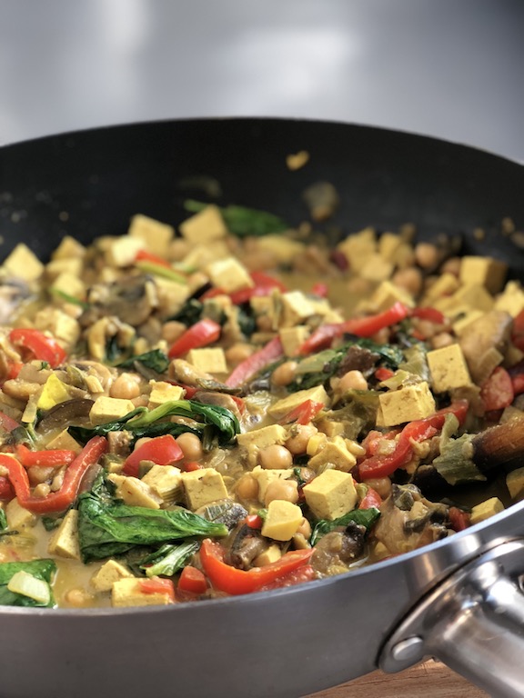 Chickpea Coconut Curry with Tofu, vegan, plantbased, in a wok