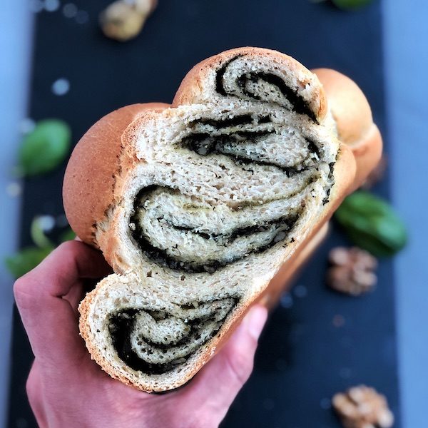 Braided Bread with Superfood Pesto with walnuts and basil leaves