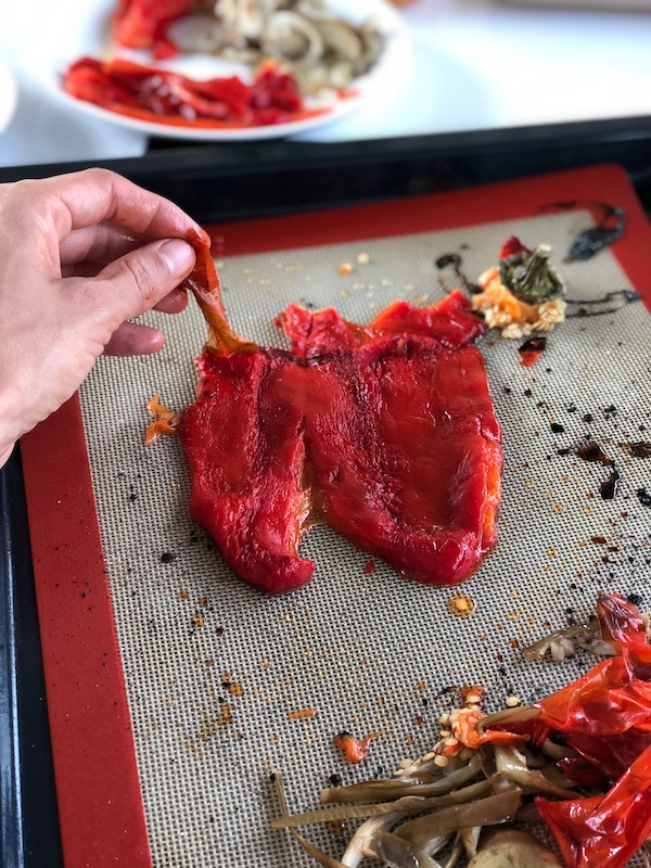 Oven roasted red bell pepper on baking tray